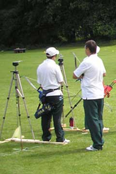 Visually Impaired archers with tactile bow-sights and observers.