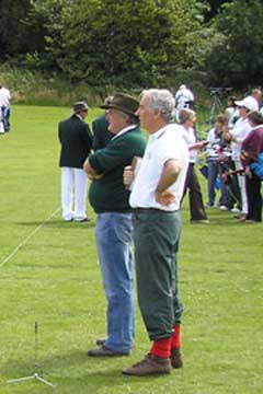 They also serve ...  Kent coaches watch the shooting.