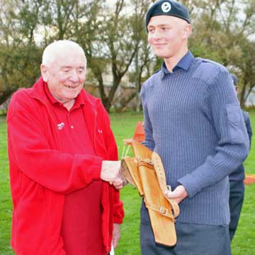 Ron Jones presented Jamie Asquith, the best cadet archer of the day, with a leather quiver.